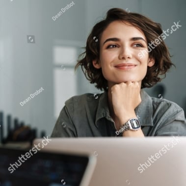 stock-photo-image-of-young-beautiful-joyful-woman-smiling-while-working-with-laptop-in-office-1786572482